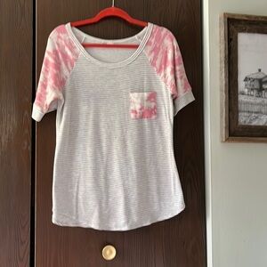 Top gray and white striped with pink Camo. Size Medium